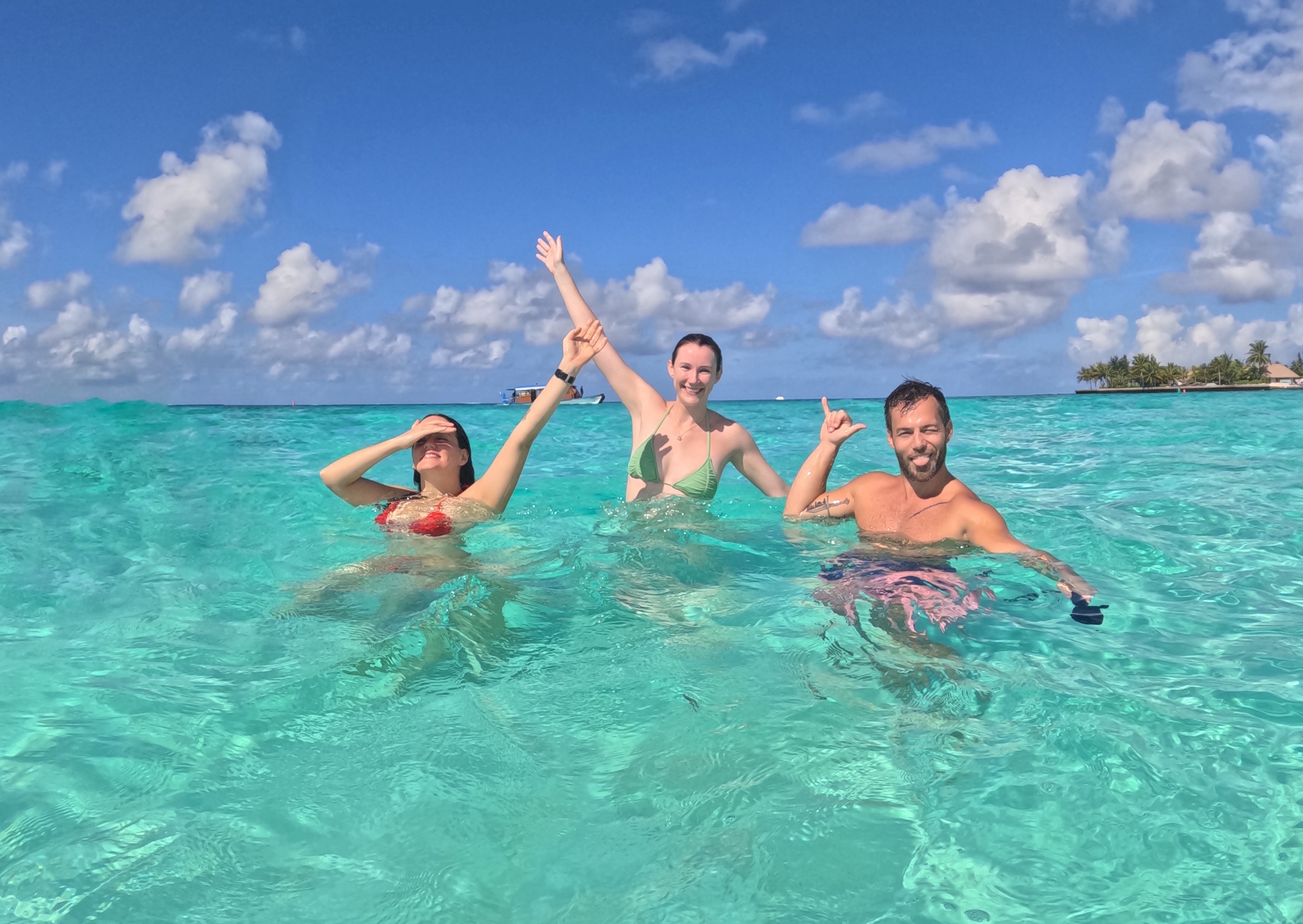 Guests swimming, Maldives Boat Escape